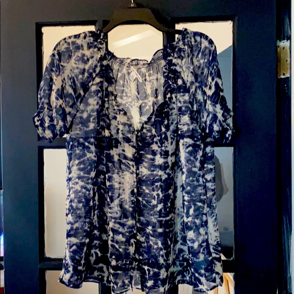 Sheer top with covered buttons